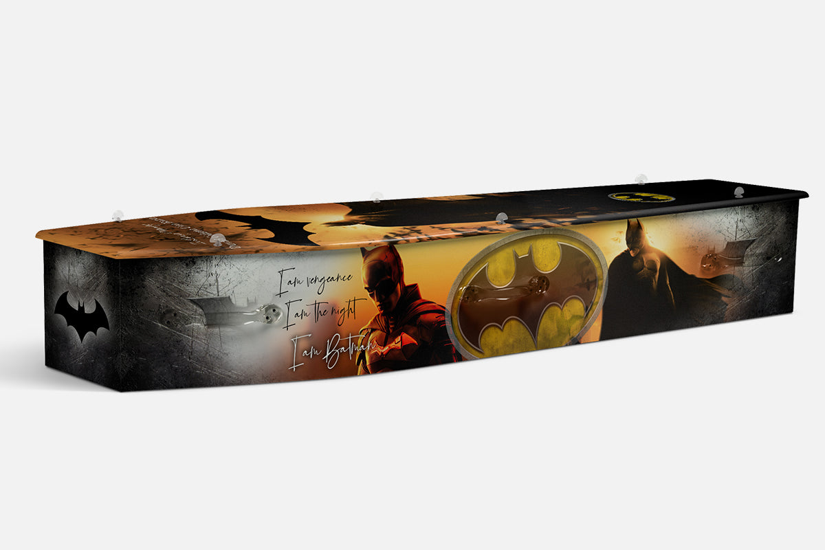 Batman coffin in black and orange with a caped figure, bat emblem and the words I am Batman