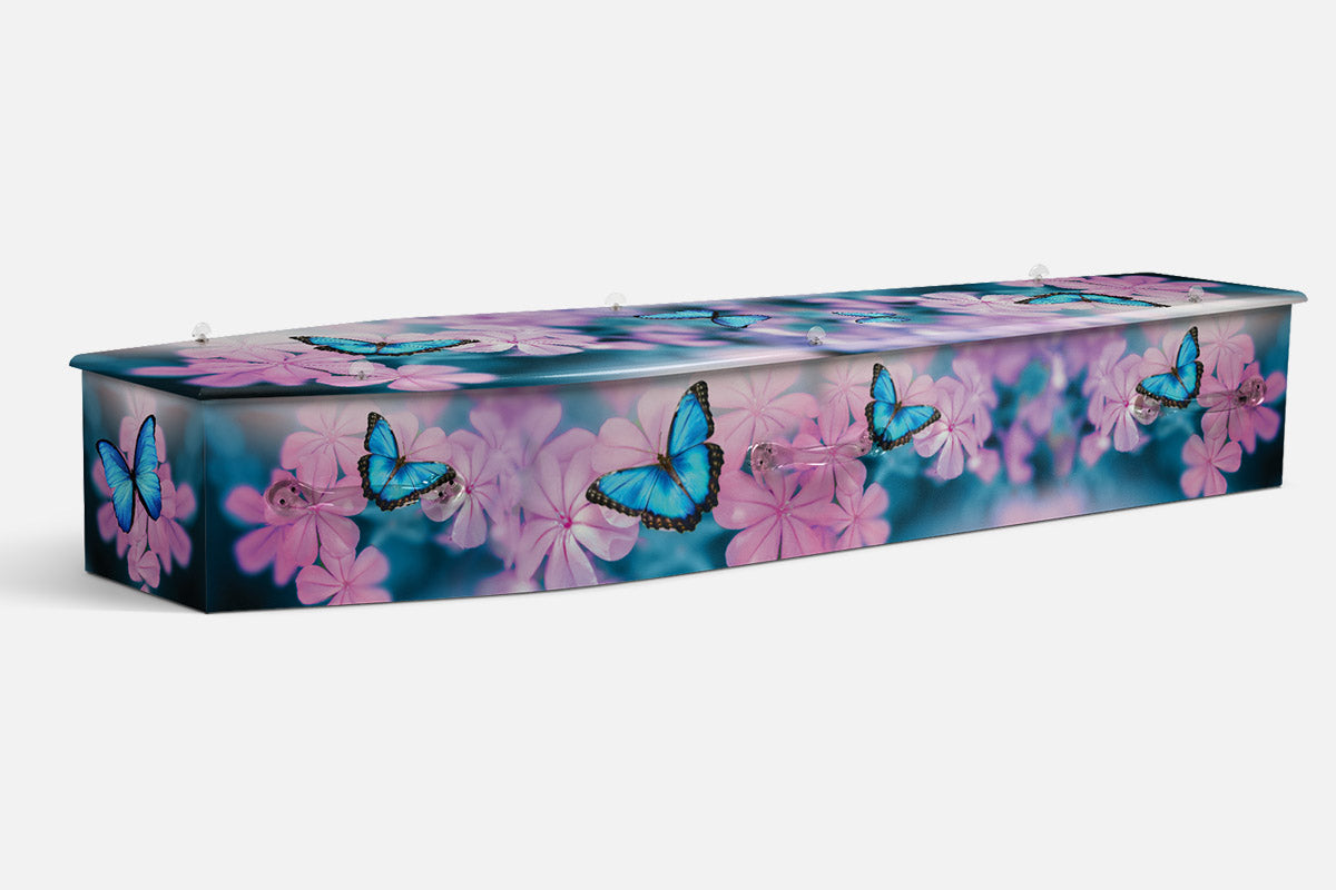 Blue Butterflies coffin in teal with pink blossom branches and bright blue butterflies