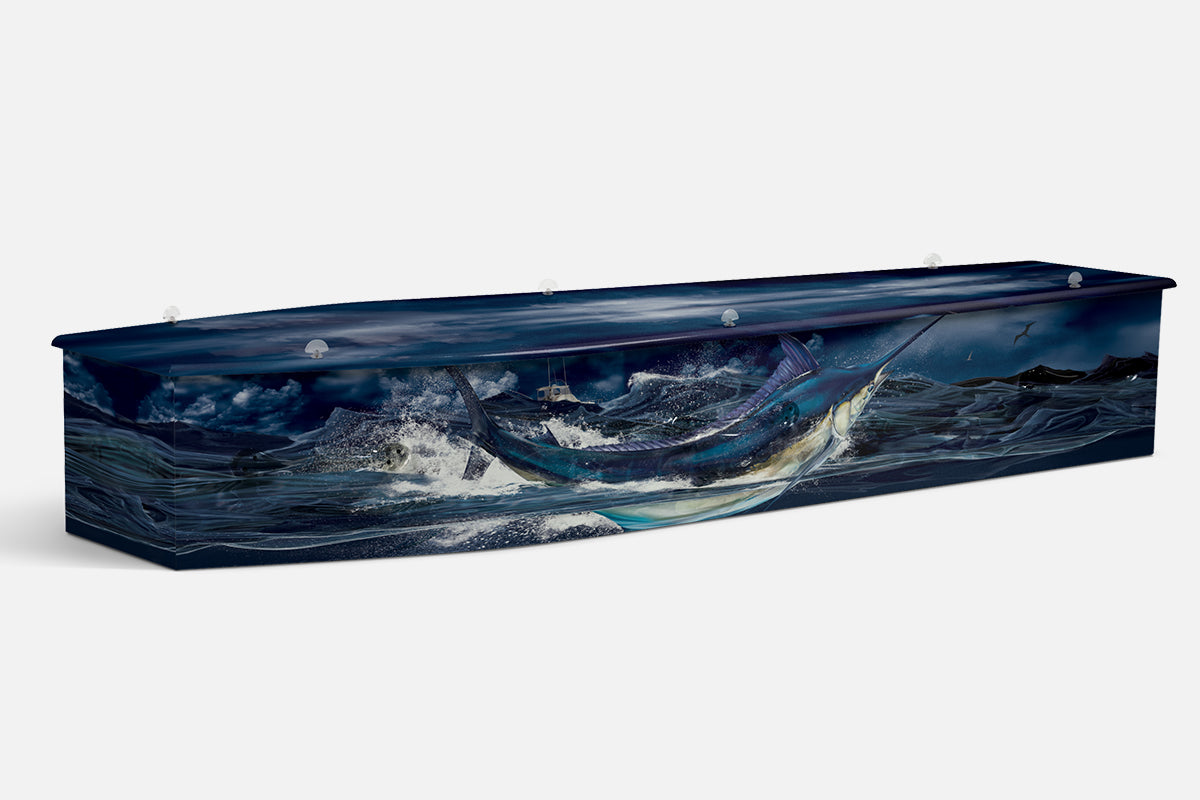 Blue Marlin coffin in dark blue with a painted marlin leaping from stormy waves beside a fishing boat