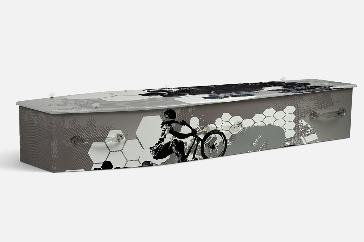 BMX coffin in a black, white and grey graphic of a rider mid jump with a hexagon pattern