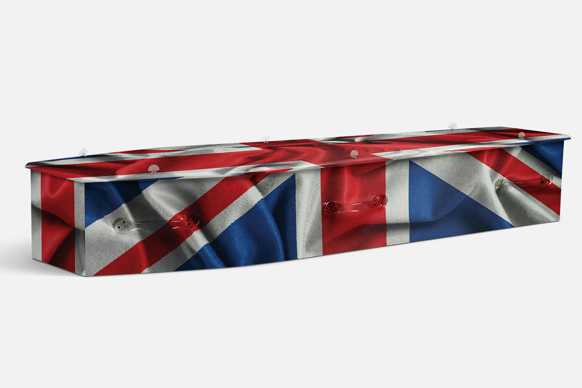British Flag coffin in red, white and blue Union Jack pattern on draped fabric
