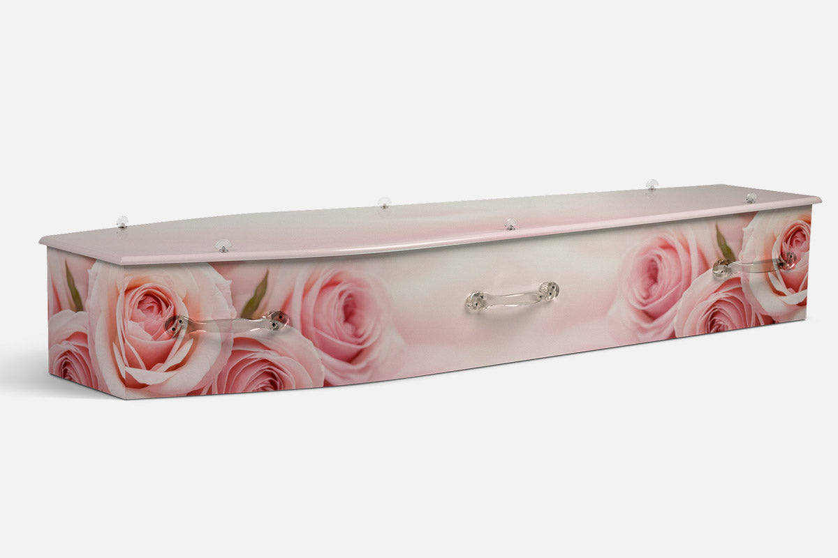 Delicate Roses coffin in blush pink rose close ups with soft green leaves