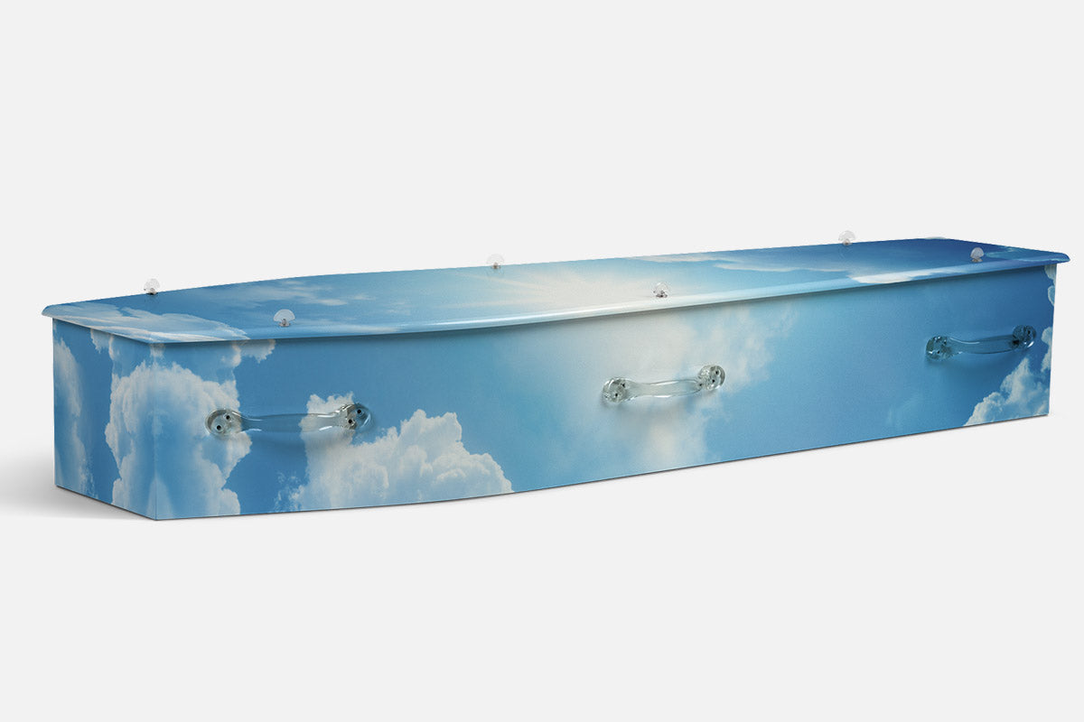 Divine Sky coffin in light blue with a photographic sky of soft white clouds and sunlight