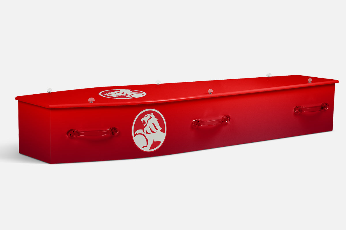 Holden coffin in red with the white Holden lion emblem on the lid and sides