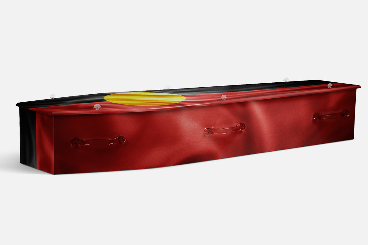 Indigenous coffin in smooth red and black with the yellow circle of the Aboriginal flag