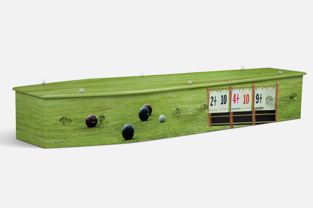 Lawn Bowls coffin showing bowls and a jack on the green beside a wooden scoreboard