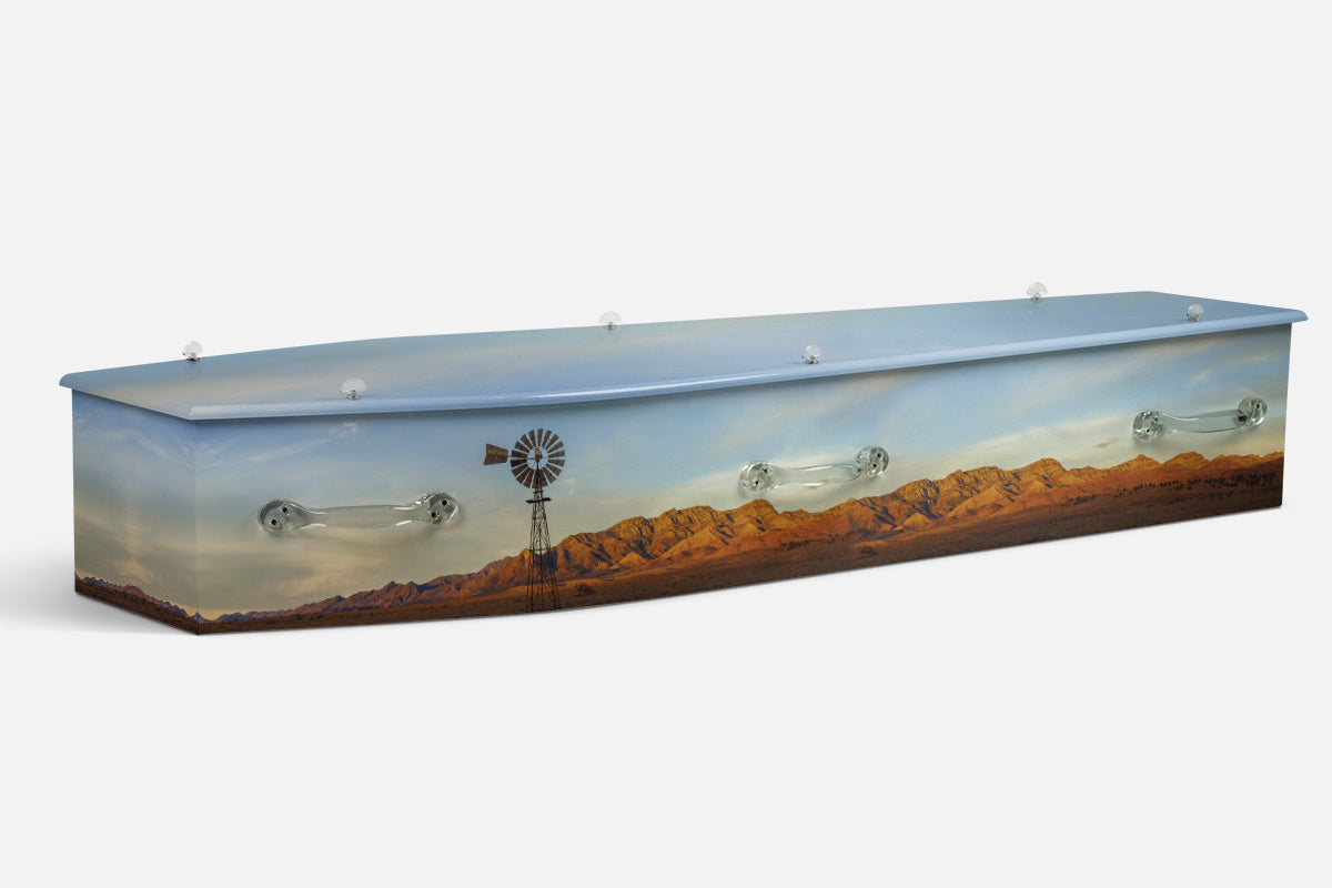 Nature Aussie Outback coffin in orange and blue with a photograph of a windmill and outback ranges