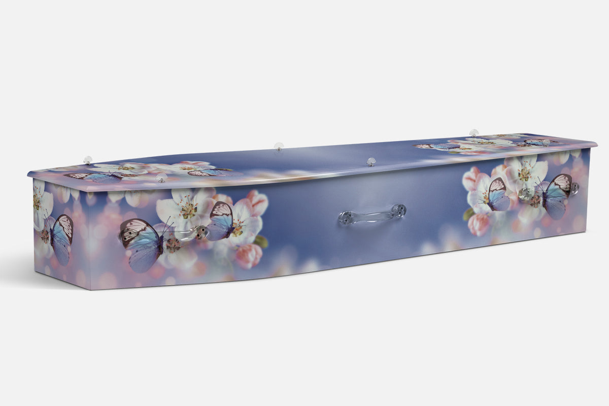 Nature Butterfly Bliss coffin in blue and pink with a photograph of blue butterflies among blossom