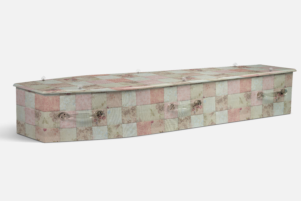 Patchwork coffin in a pastel checked pattern of pink, green and cream floral fabric squares