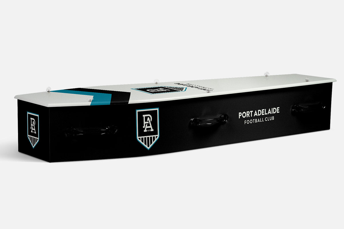 Port Adelaide coffin in black and white with a teal diagonal stripe and the PA crest