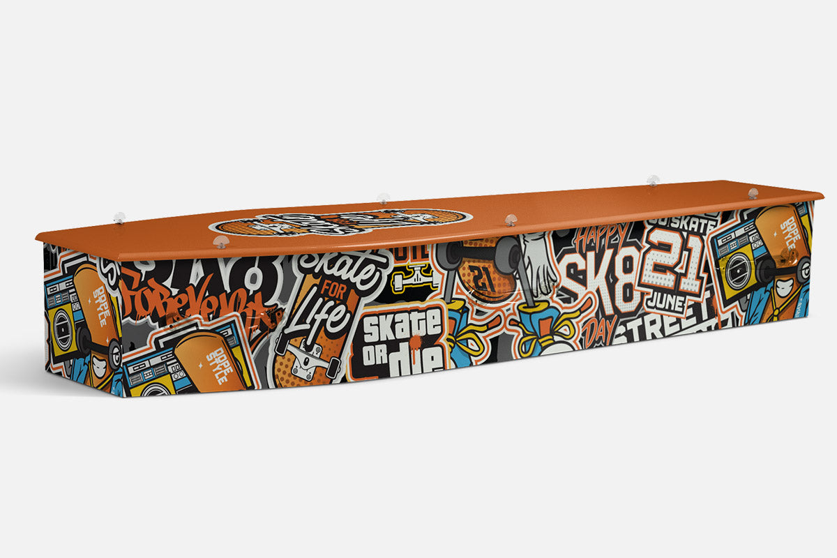 Skater coffin in orange and black graffiti style with skateboards, boomboxes and Skate or Die lettering