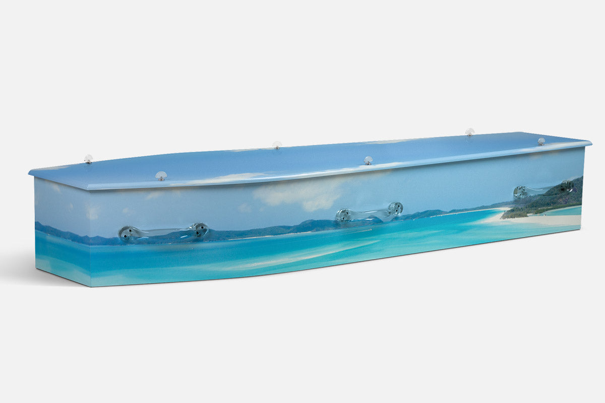 The Whitsundays coffin in a photographic aerial scene of turquoise water, white sand and green islands