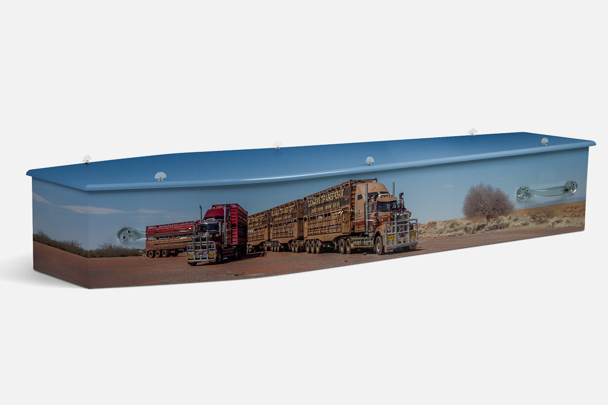 Trucking coffin showing a road train with red cab and cattle trailers on an outback dirt road