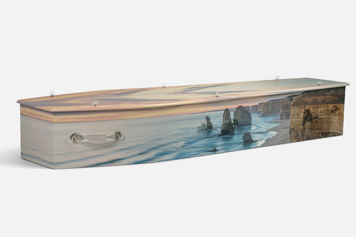 Twelve Appostles coffin in a photographic scene of limestone sea stacks and cliffs at sunset