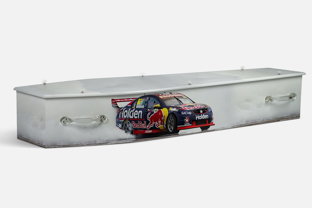 V8 Supercar coffin in a black and red Holden Red Bull racing car doing a burnout in white smoke