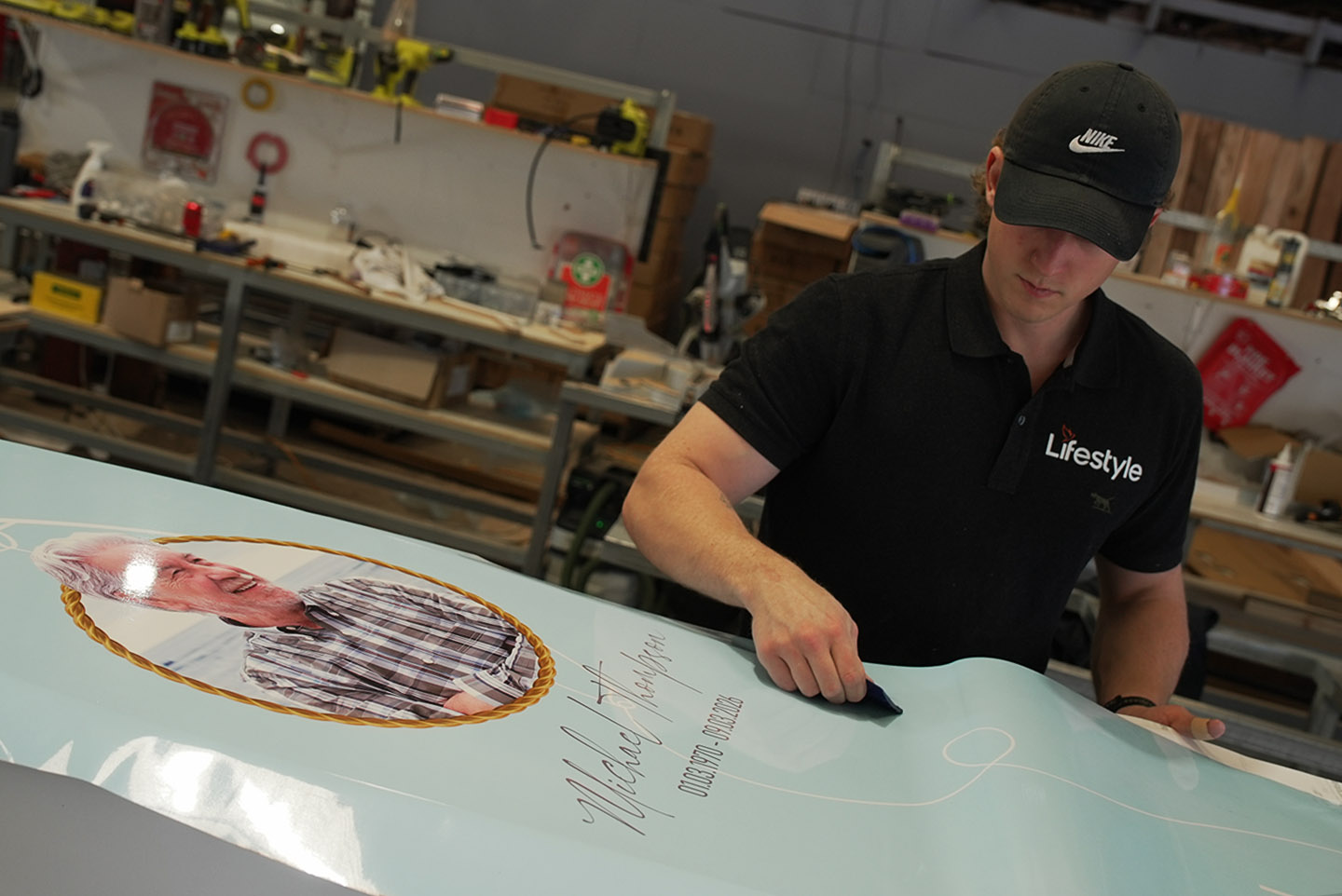 Luke wrapping a personalised coffin for Lifestyle Coffins in Port Adelaide